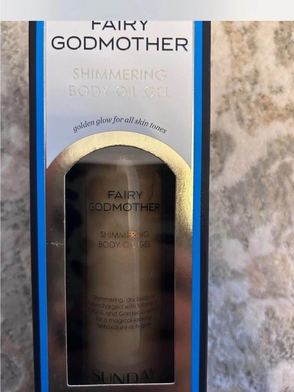 Sunday Riley Fairy Godmother Shimmering Body Oil Gel - Blue and Gold Accents